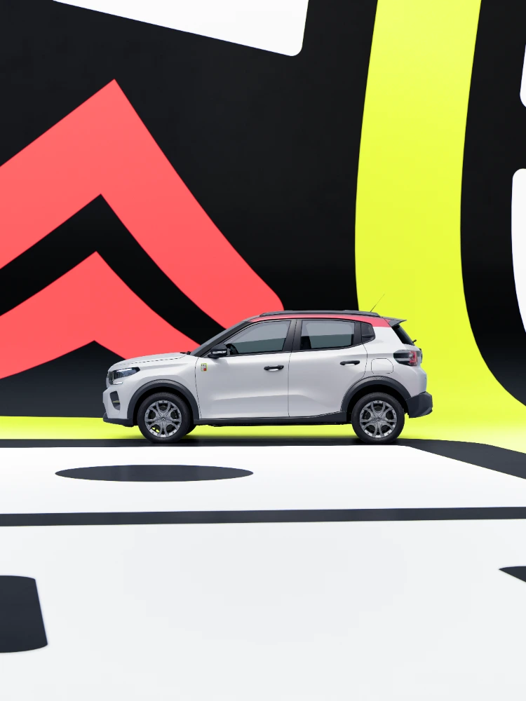 Zijaanzicht Citroën ë‑C3 TONIC limited edition elektrische stadsauto in studio-opstelling
