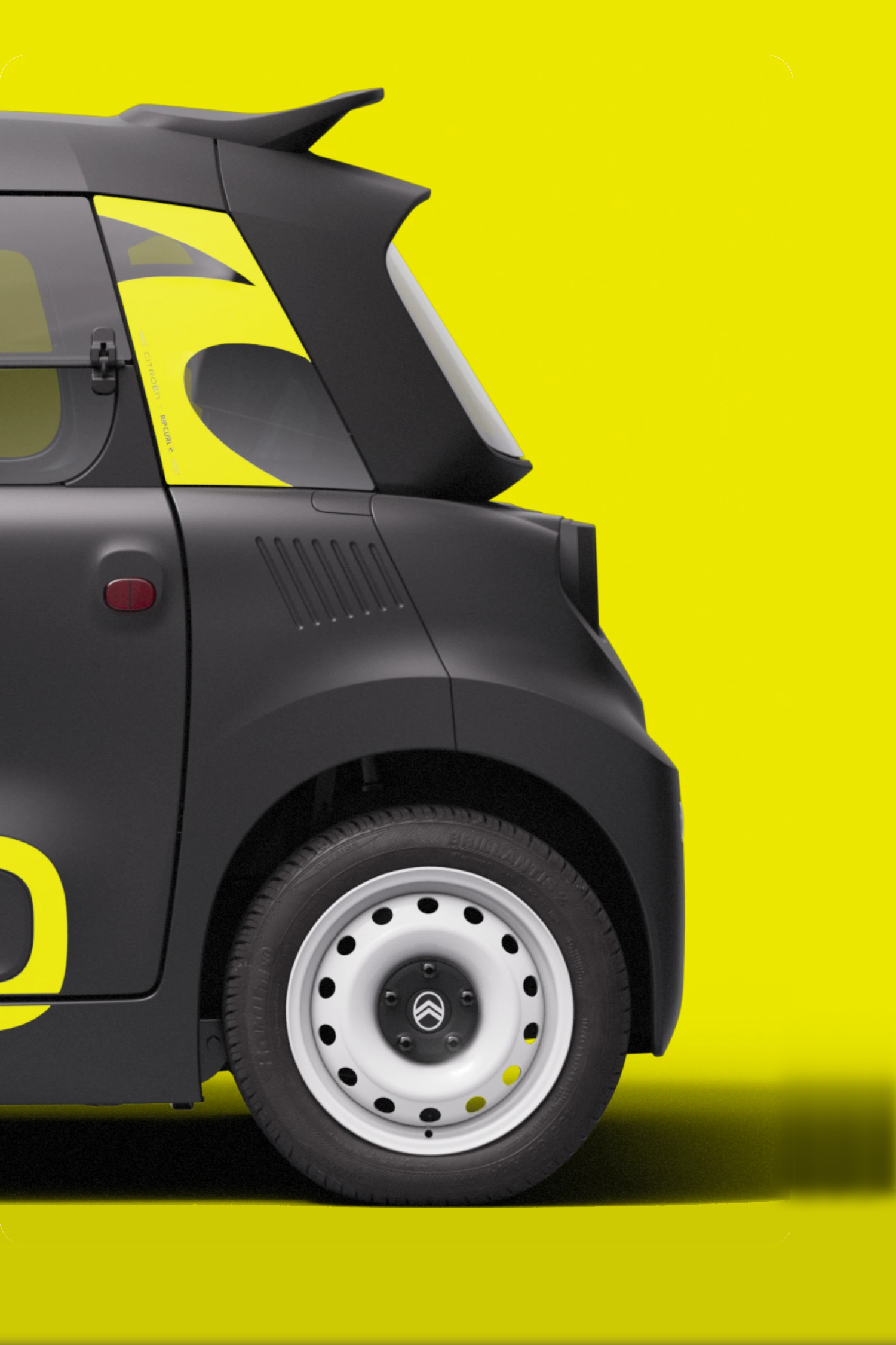 Side rear view Citroën Ami Rip Curl shows compact safe reliable electric design delivering innovative urban mobility freedom.