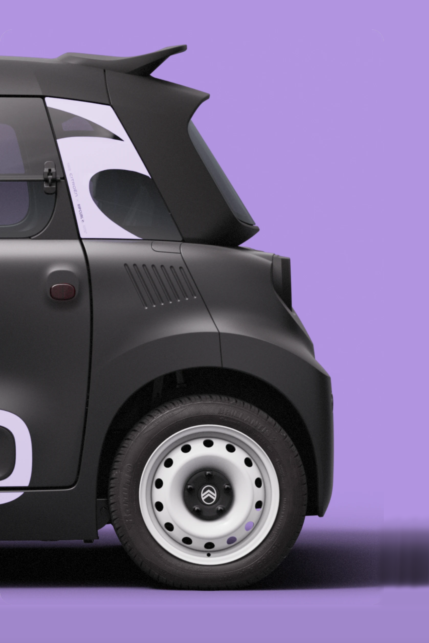 Side rear view Citroën Ami Rip Curl shows compact safe reliable electric design delivering innovative urban mobility freedom.