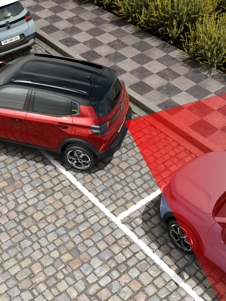 Bovenaanzicht van de Citroën ë‑C3 elektrische SUV met parkeersensoren achter voor veiliger, zelfverzekerd en betaalbaar manoeuvreren in de stad.