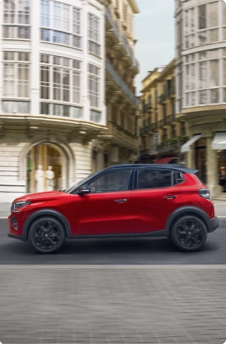 Zijaanzicht van de Citroën C3 compacte SUV met modern stadsdesign voor soepele, zelfverzekerde en betaalbare mobiliteit.