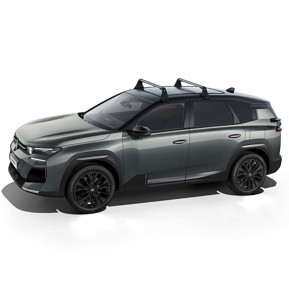 Zijaanzicht van de ë‑C5 Aircross met dakdragers die extra laadcapaciteit voor reizen en transport tonen.