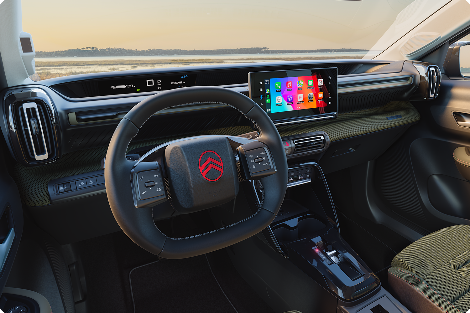 Close-up van het dashboard van de Citroën C3 Outdoor: het touchscreen toont Advanced Comfort-connectiviteit voor reizen met de compacte SUV.