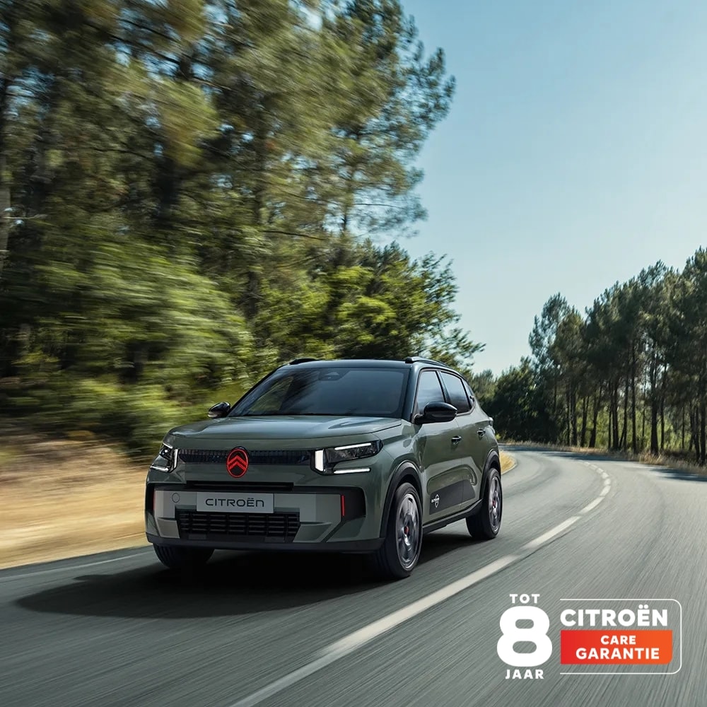 Front three-quarter view Citroën ëC3 Outdoor with LED signature shows Citroën Advanced Comfort on scenic drive
